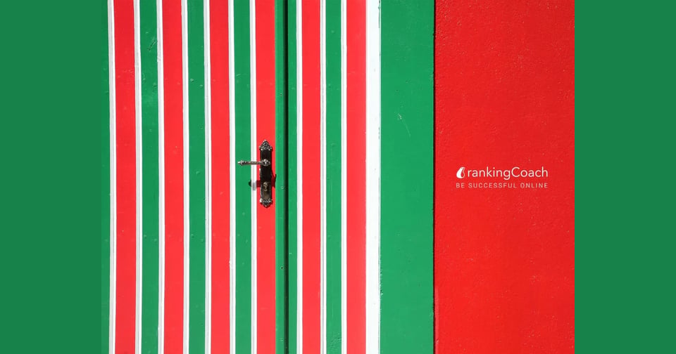 Red and green striped door with metal handle and rankingCoach logo